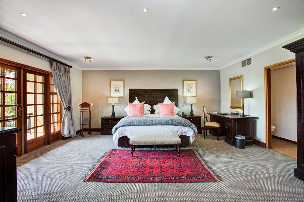 Irene Country Lodge, Autograph Collection Centurion Luaran gambar A bedroom at the Oyster Box